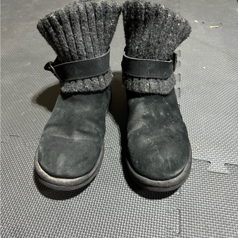 Black UGGs with buckle. Very worn. Side 9.